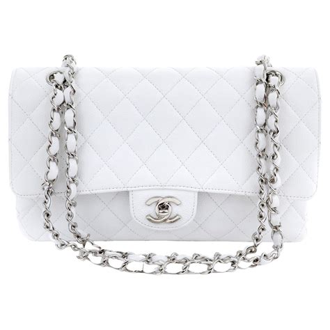 white and silver chanel bag